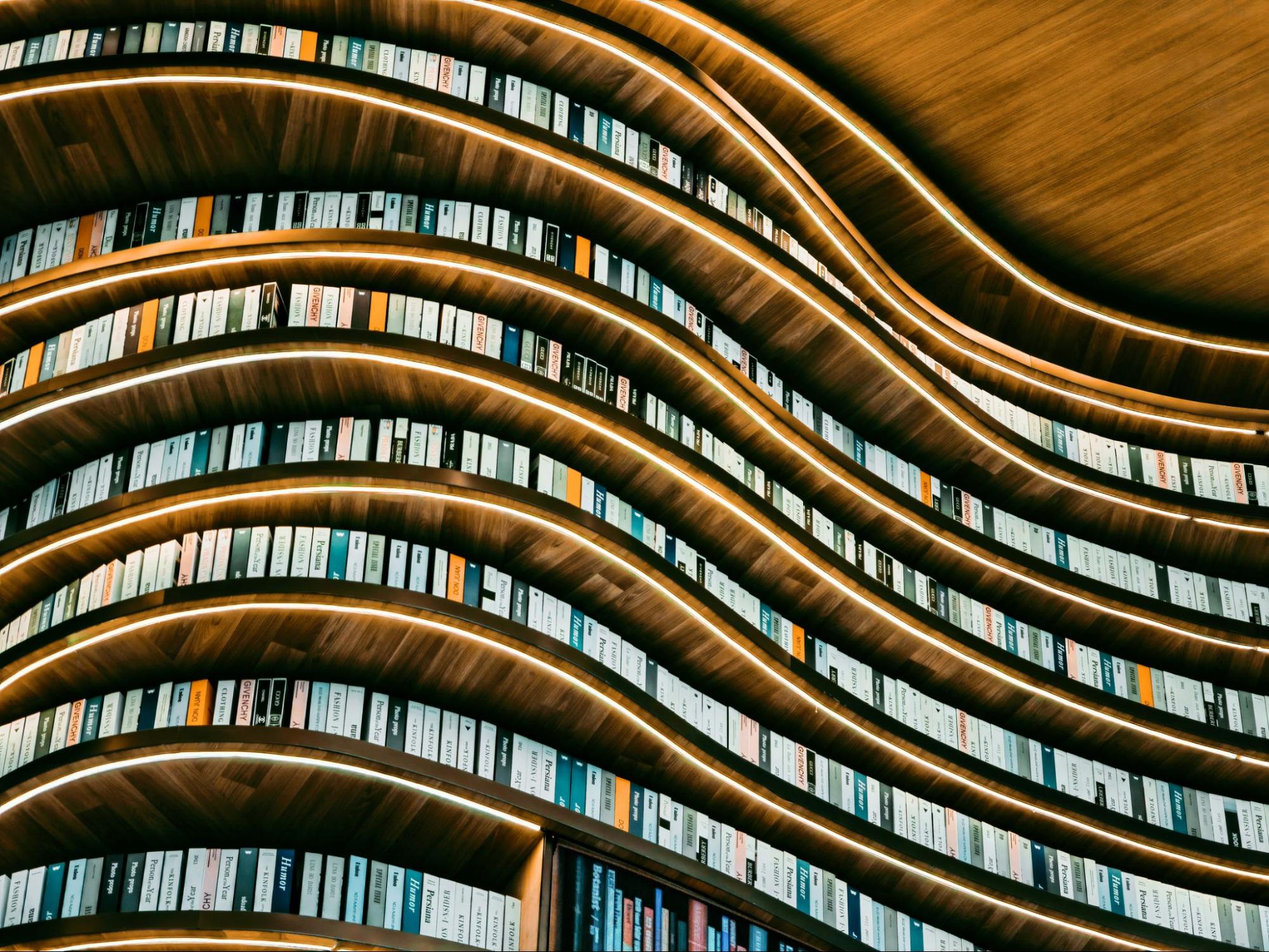 Wavy wooden library shelf